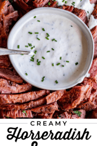 bowl of horseradish sauce surrounded by corned beef