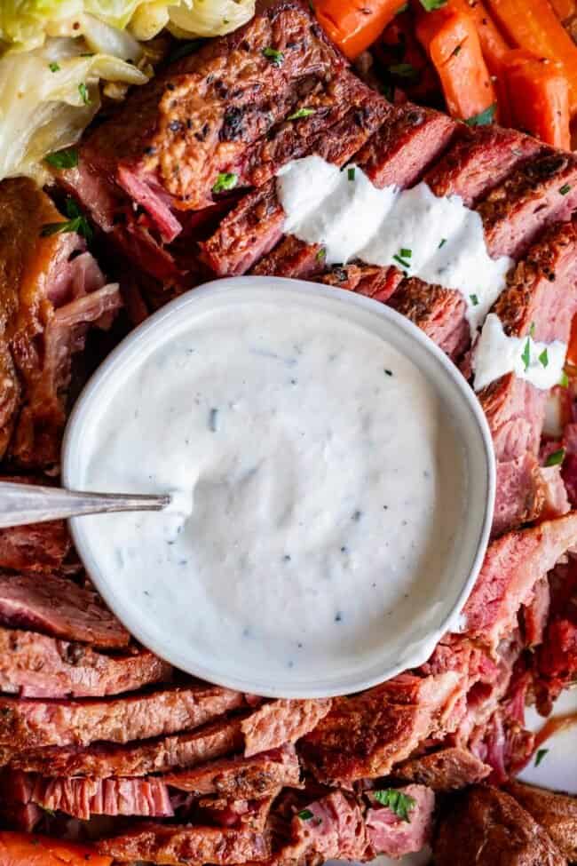 horseradish sauce recipe in a white bowl with corned beef