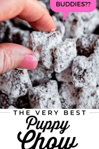 pin for puppy chow recipe, fingers holding chunky muddy buddies with pink text