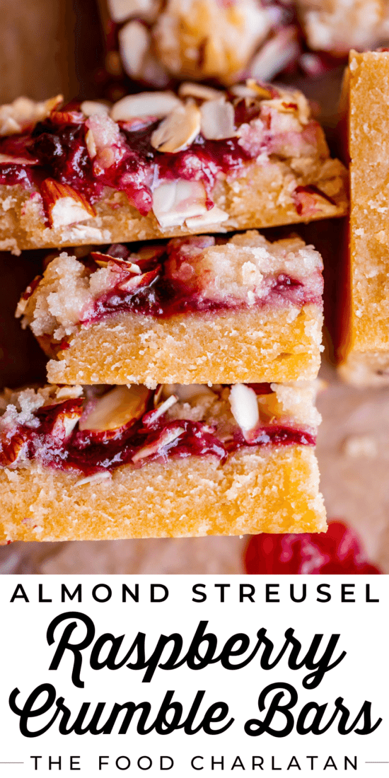 stacked up raspberry shortbread bars with jam.