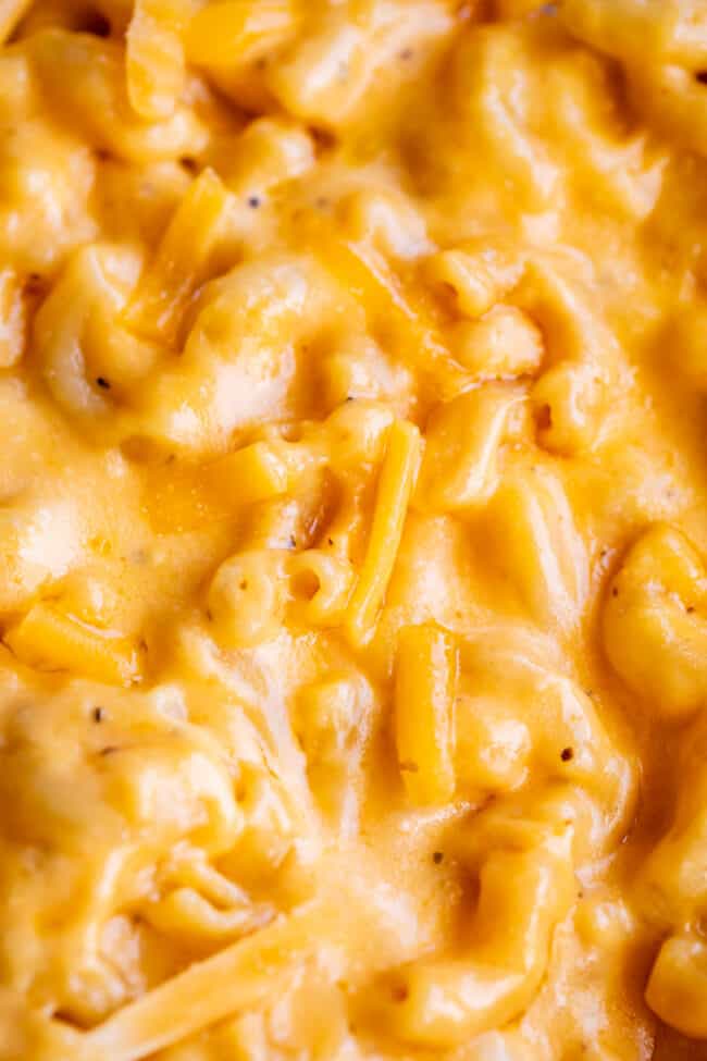 overhead closeup shot of mac and cheese in slow cooker.