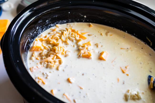 crock pot macaroni and cheese before it has cooked.