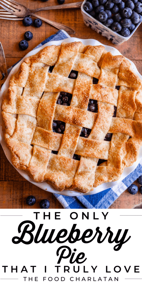 whole blueberry pie with a lattice crust shot from overhead.