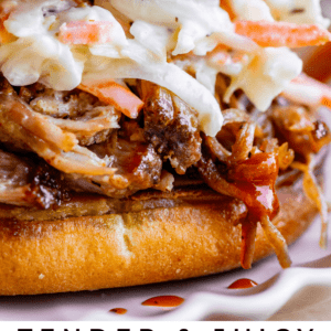 close up shot of smoked pulled pork sandwich with coleslaw.