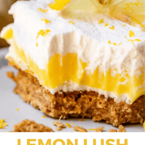 A close-up of a lemon lush dessert slice with a crumbly crust, creamy lemon filling, whipped topping, and a lemon garnish. The text below reads Lemon Lush Dessert – The Food Charlatan.