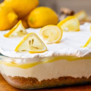 Lemon lush dessert topped with lemon slices.