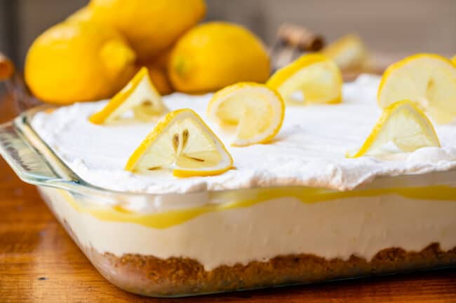 Lemon lush dessert topped with lemon slices.