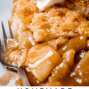 easy apple cobbler recipe on a white plate, topped with ice cream.