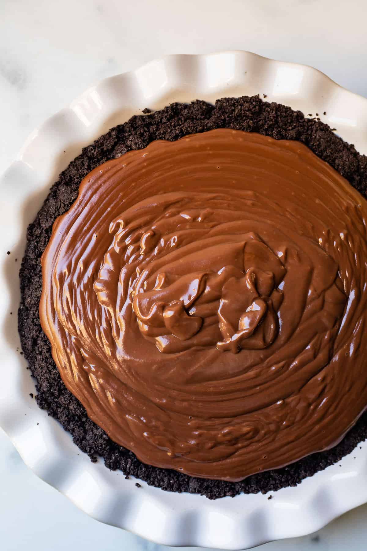 chocolate pudding in an oreo crust shot from overhead.