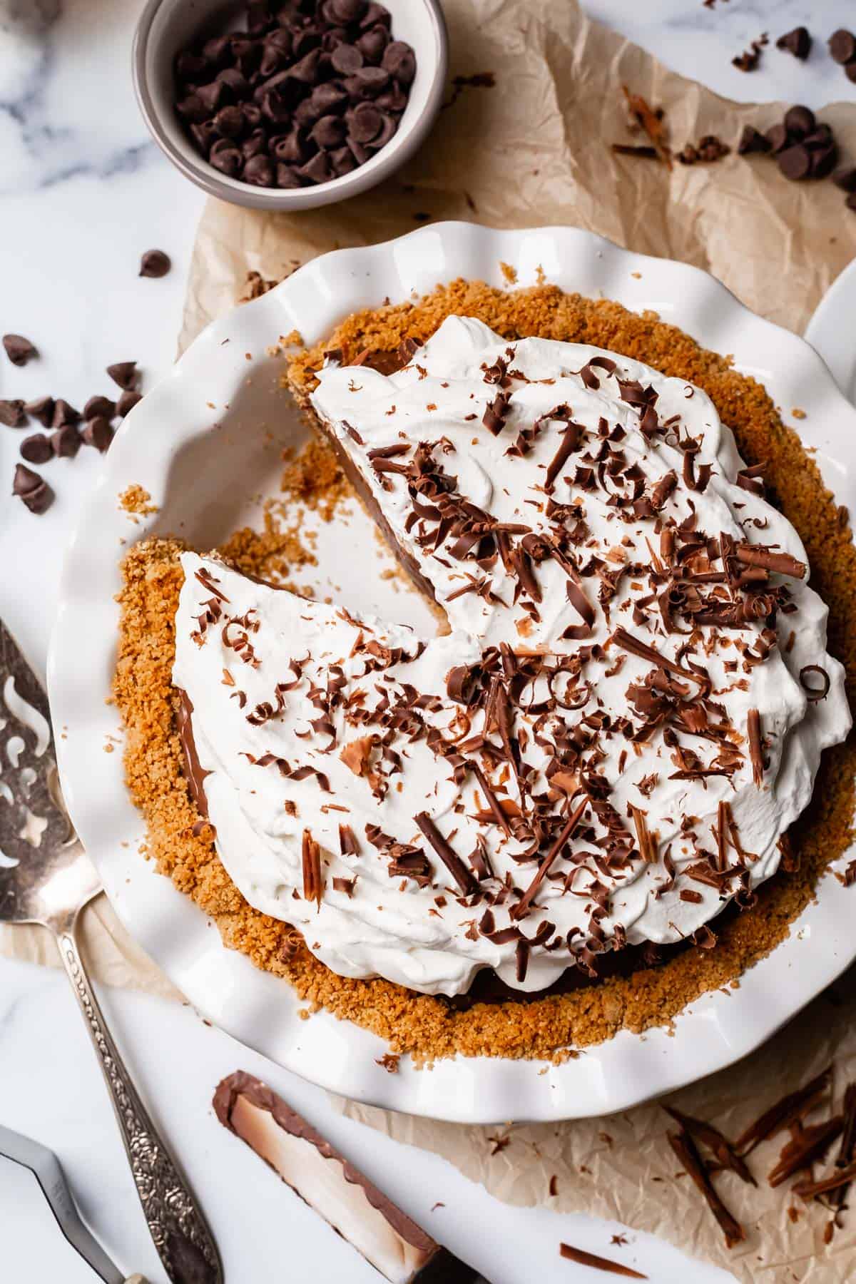 overhead shot of chocolate cream pie with graham cracker crust.