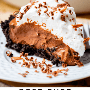 chocolate cream pie with oreo crust and whipped cream and chocolate curls.