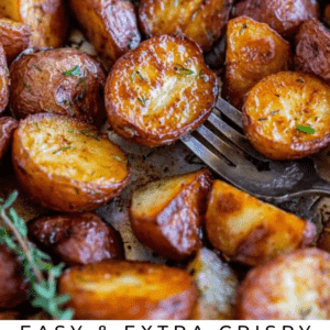 Roasted red potatoes with crispy edges on pan with recipe name