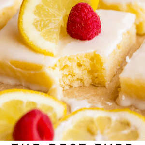 lemon sheet cake with glaze and fresh raspberries.
