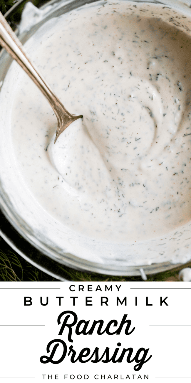 homemade buttermilk ranch dressing in a mason jar with a metal spoon.