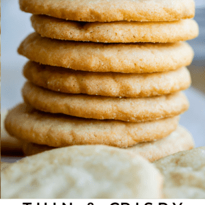 thin and crispy sugar cookies in a stack.