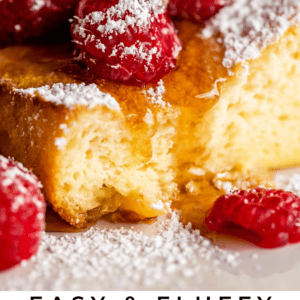 german pancakes with fresh raspberries and powdered sugar.