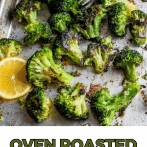 A baking sheet with roasted broccoli florets and lemon slices, some pieces perfectly charred, with the text Oven Roasted Broccoli and The Food Charlatan below the image.