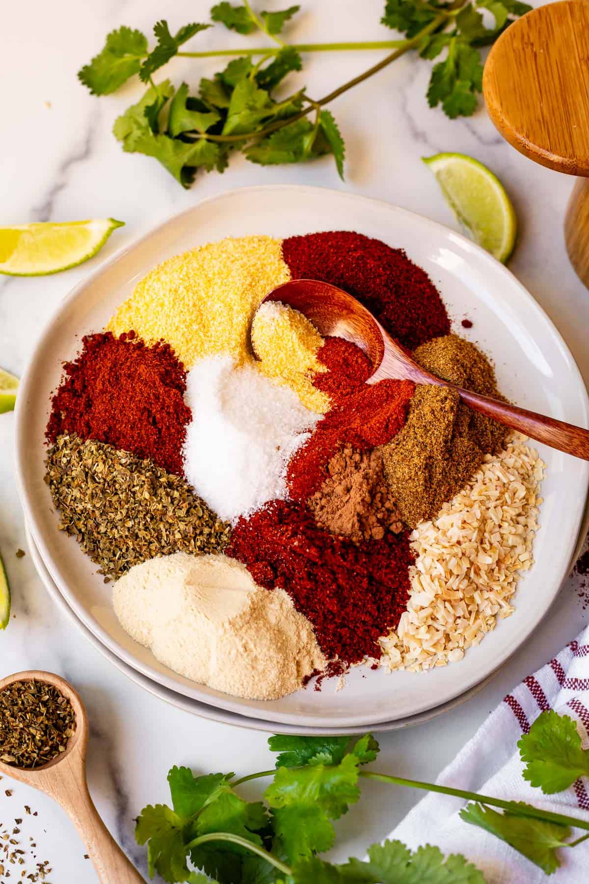 spices for diy taco seasoning on a plate ready to be mixed.