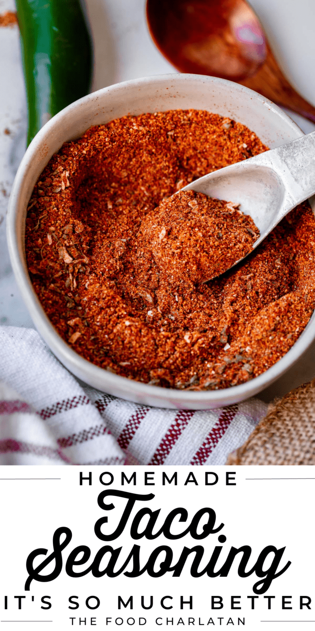 taco seasoning recipe in a white bowl with a metal spoon.