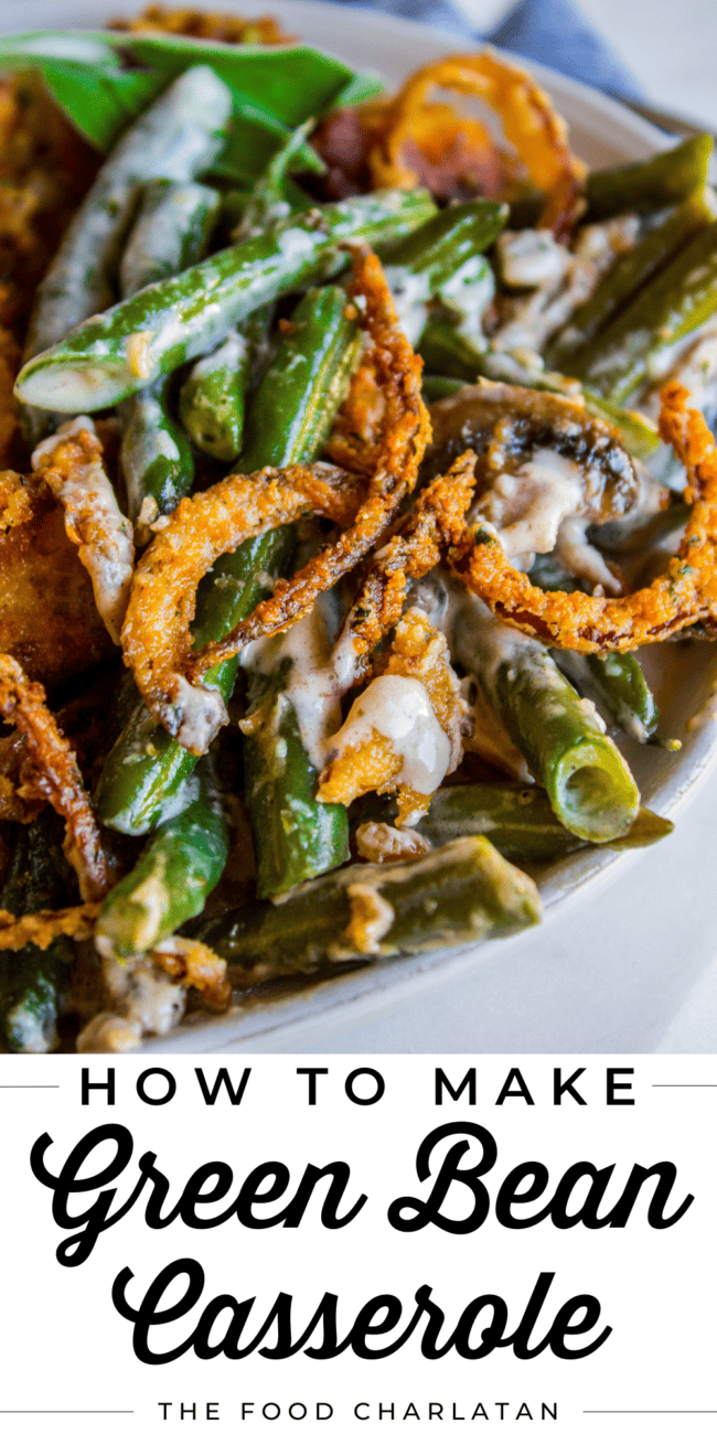homemade green bean casserole with crispy fried onions in a white bowl.