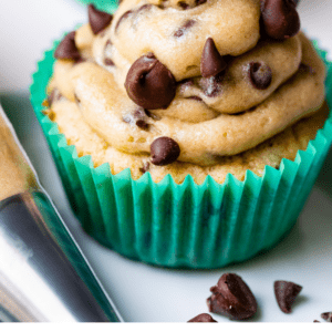 cupcakes with cookie dough frosting in green liners.