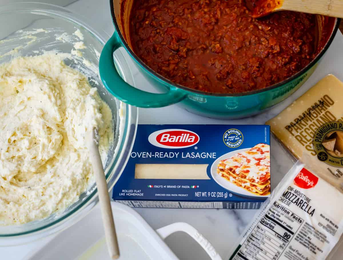 ingredients for easy lasagna recipe spread out on counter.