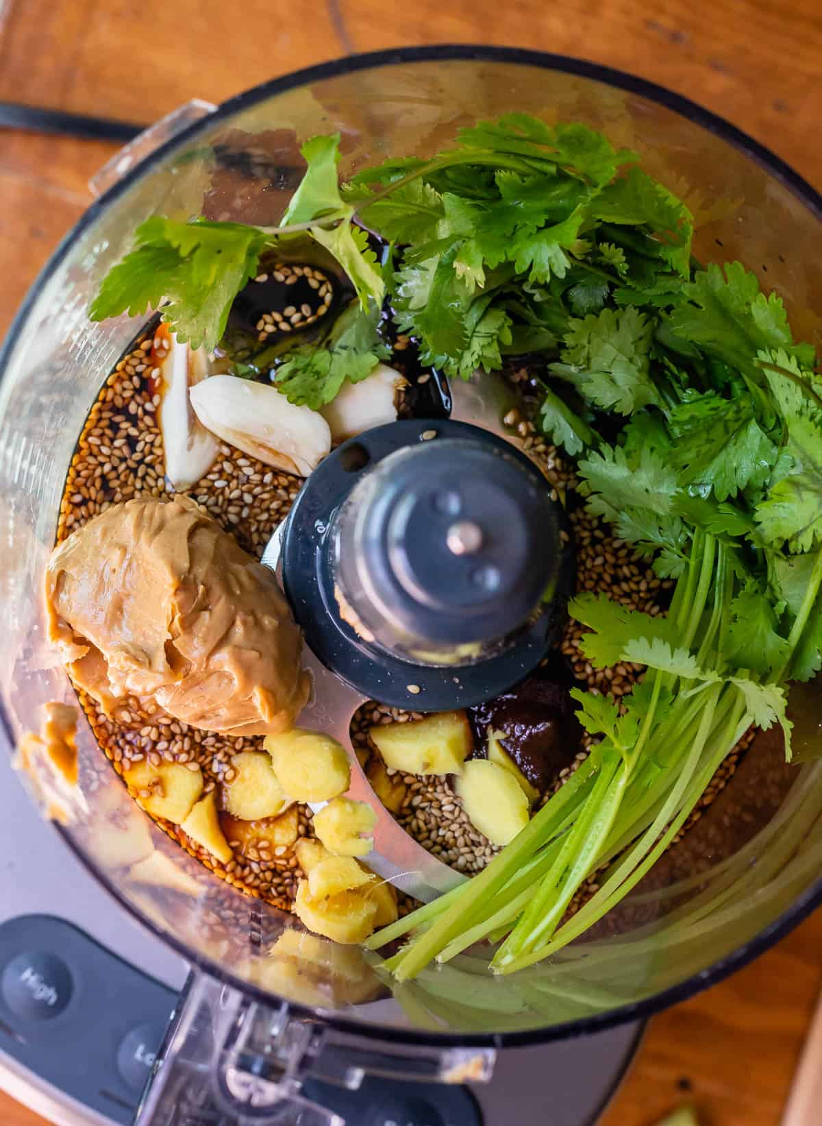 sesame seeds, soy sauce, peanut butter, ginger, and more in food processor to make sesame noodle sauce.