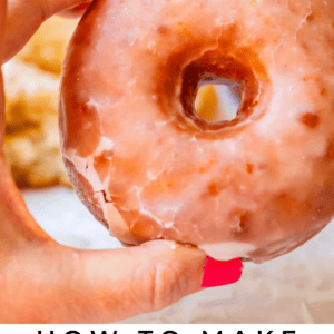 hand holding a homemade glazed donut with text "how to make homemade glazed donuts".