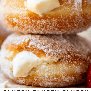 two stacked homemade donuts with text "fluffy Bavarian cream-filled donuts".