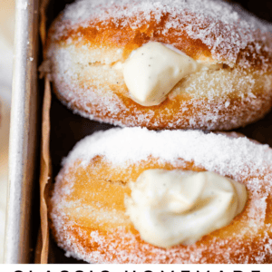 Donuts in a metal baking dish with text "Classic homemade donuts with Bavarian cream filling".