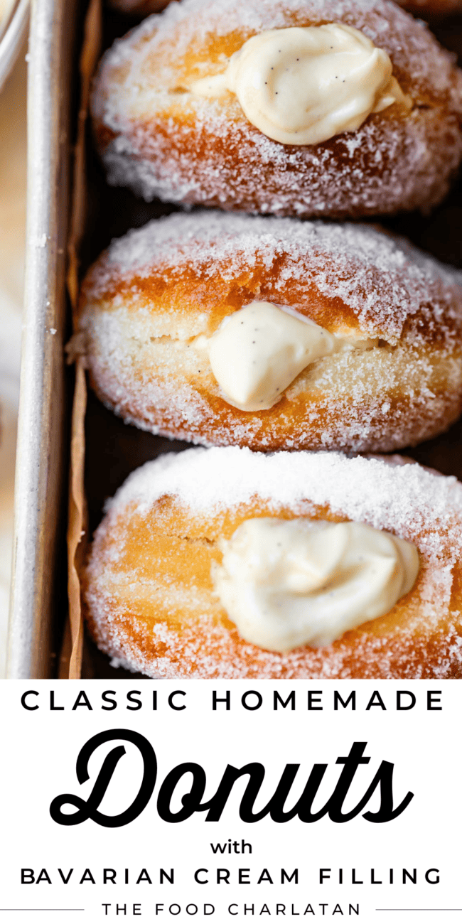 Donuts in a metal baking dish with text "Classic homemade donuts with Bavarian cream filling".