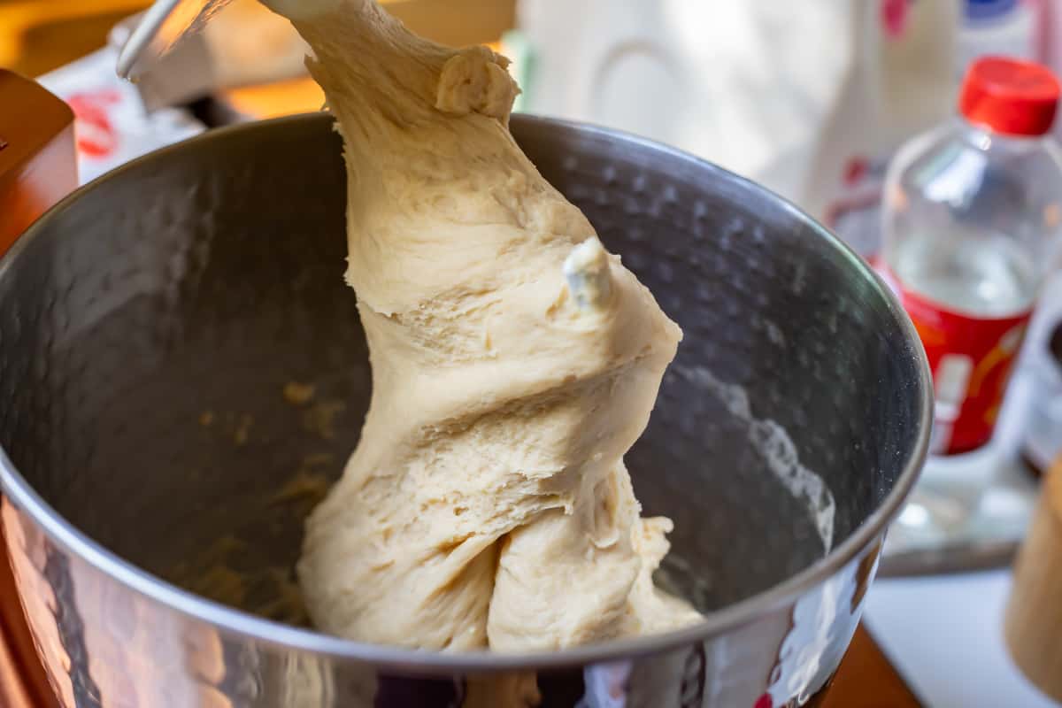 finished dough for homemade bavarian cream donuts on dough hook.