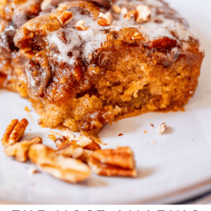image of cut piece of picnic cake with a bite taken out of it with text "the most amazing picnic cake".