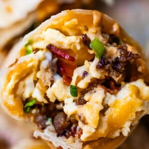 Breakfast burrito with sausage eggs and cheese.