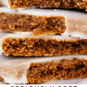 stack of chewy gingerbread cookies with glaze.