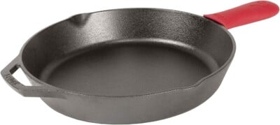cast iron skillet with silicone handle cover.