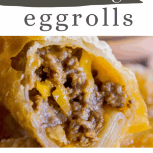 Close-up of cheeseburger egg rolls cut open, revealing seasoned ground beef and melted cheese inside a crispy wrapper. Text reads cheeseburger eggrolls—thefoodcharlatan.com.