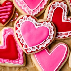 heart shaped cookies with icing made to look like lace doily.