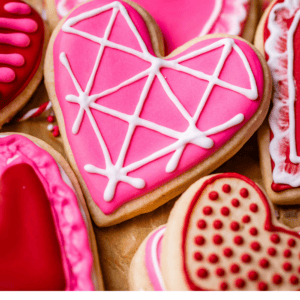 pin image of heart with decorative frosting.