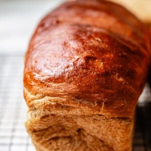rye bread loaf on a cooling rack.