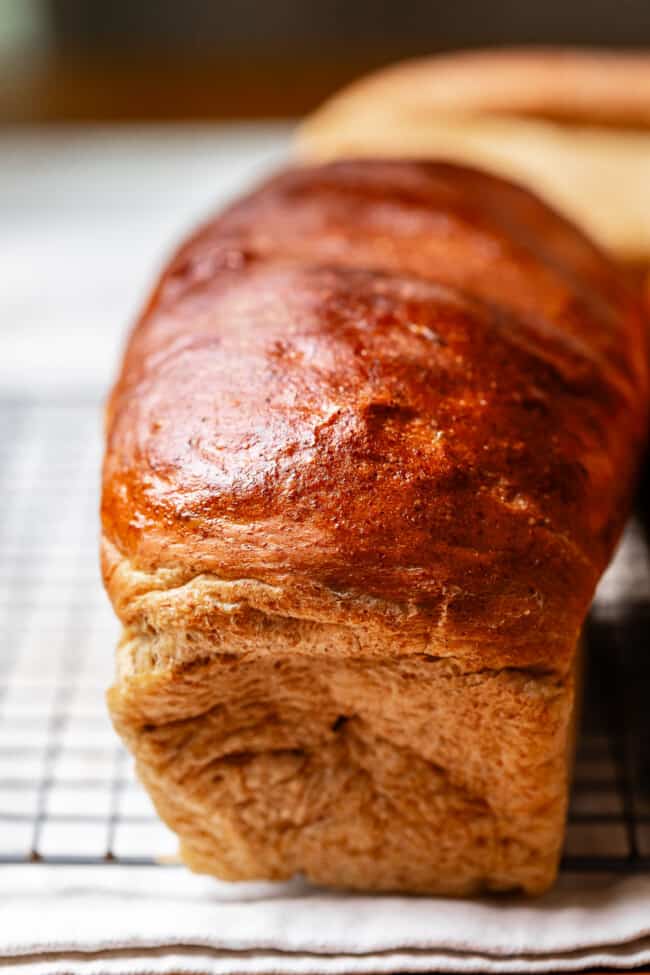rye bread loaf on a cooling rack.