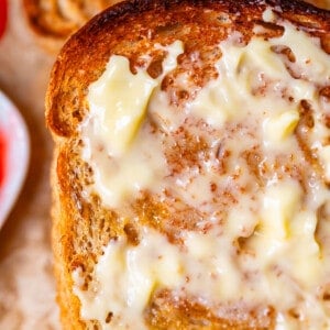 butter melting on a slice of toast.