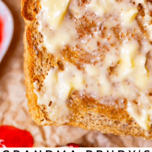 butter melting on a slice of rye bread toast.
