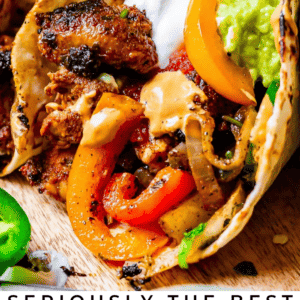 close up of a really full chicken fajita with text "seriously the best chicken fajitas you'll ever make".