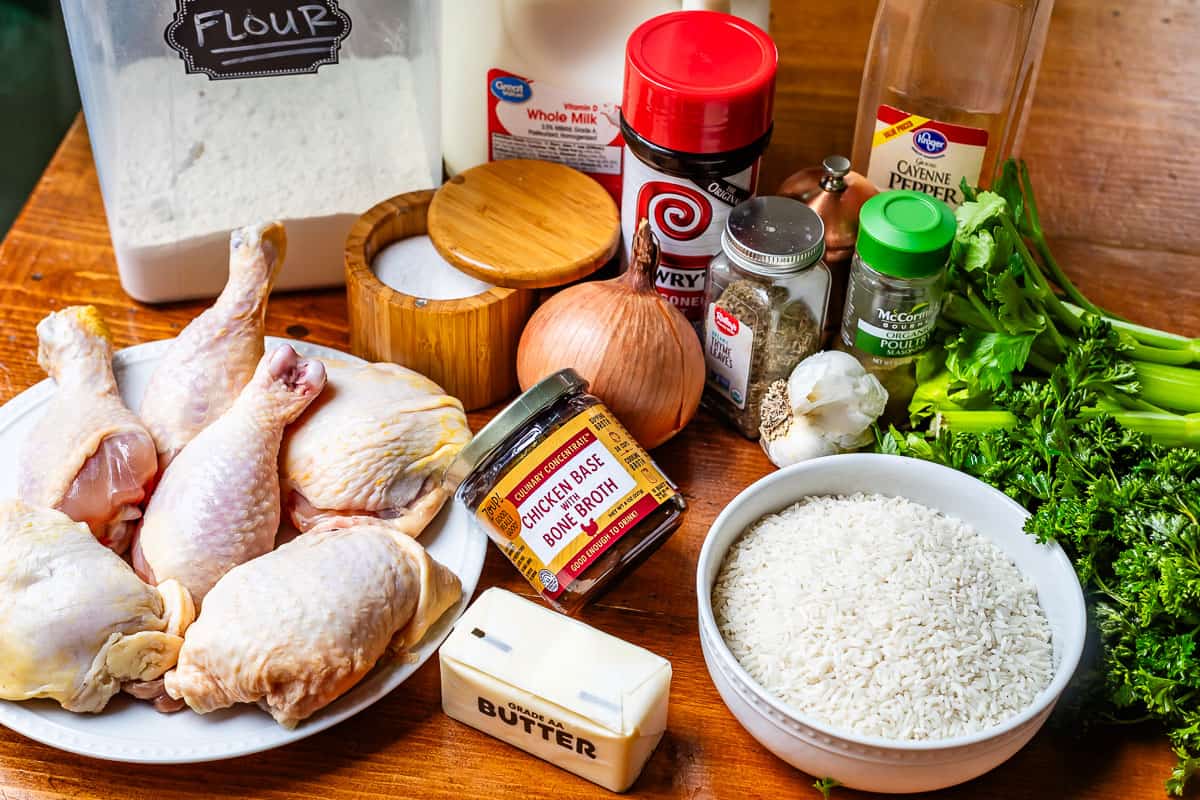 Ingredients to make chicken and rice casserole - chicken, rice, and ingredients for white sauce.