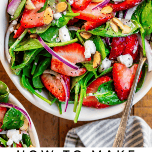 bowl with dressed salad and text "how to make strawberry spinach salad".