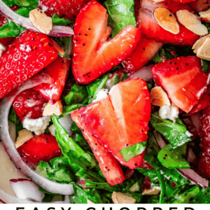 strawberries in chopped spinach salad with text "easy chopped strawberry spinach salad".