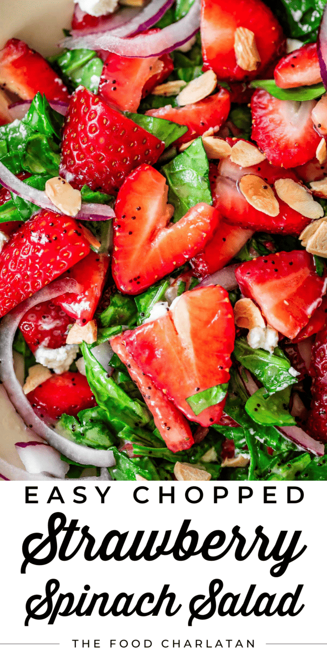 strawberries in chopped spinach salad with text "easy chopped strawberry spinach salad".