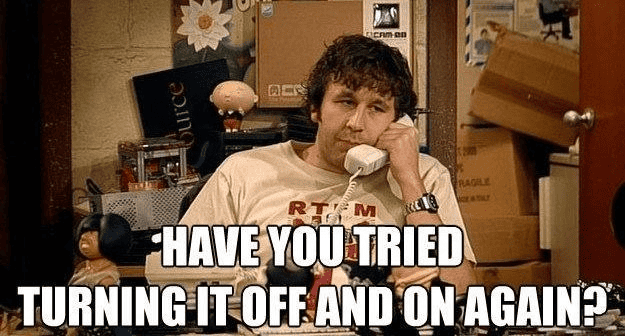 scene from the IT Crowd tv show with text "have you tried turning it off and on again".