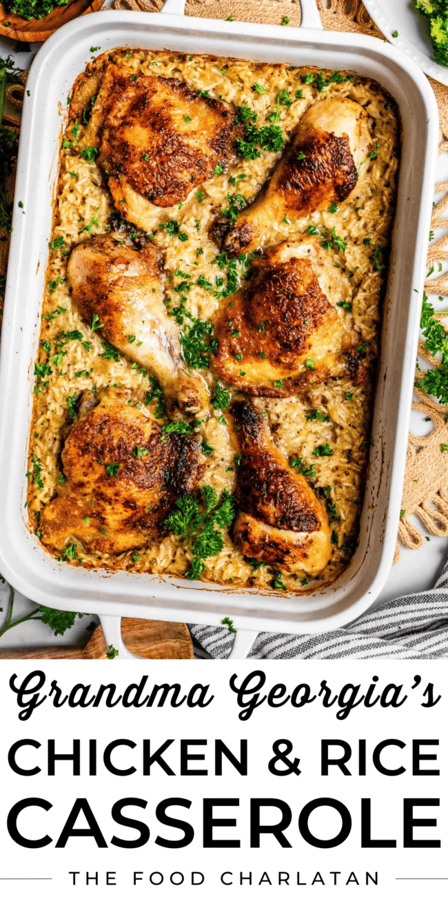 overhead shot of browned chicken thighs and drumsticks and rice in a white casserole dish.